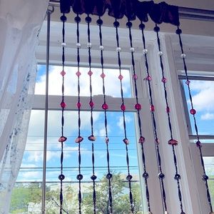 Beaded window treatment or decoration for doorway